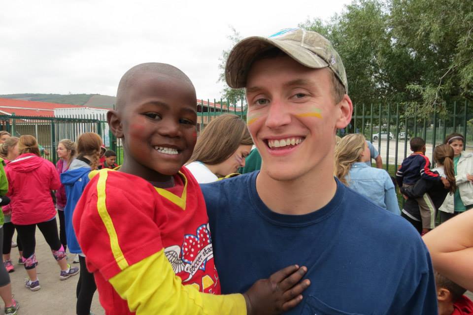 ZACH MAKING FRIENDS WITH THE CHILDREN IN THE TOWNSHIP OF SIR LOWRY'S PASS
