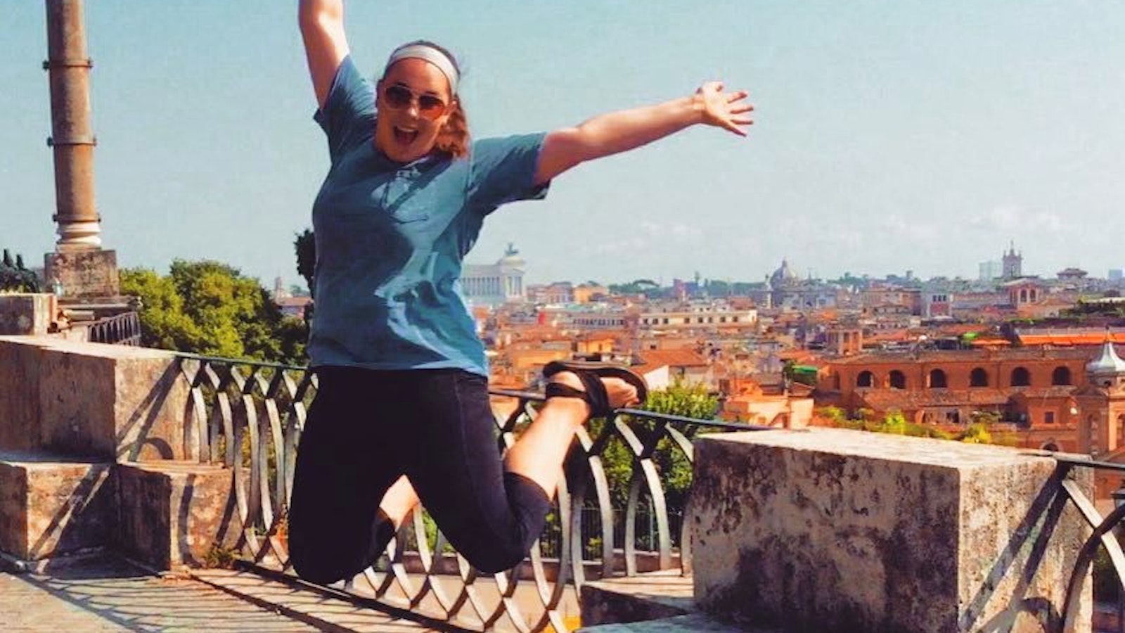 Student jumping in Rome